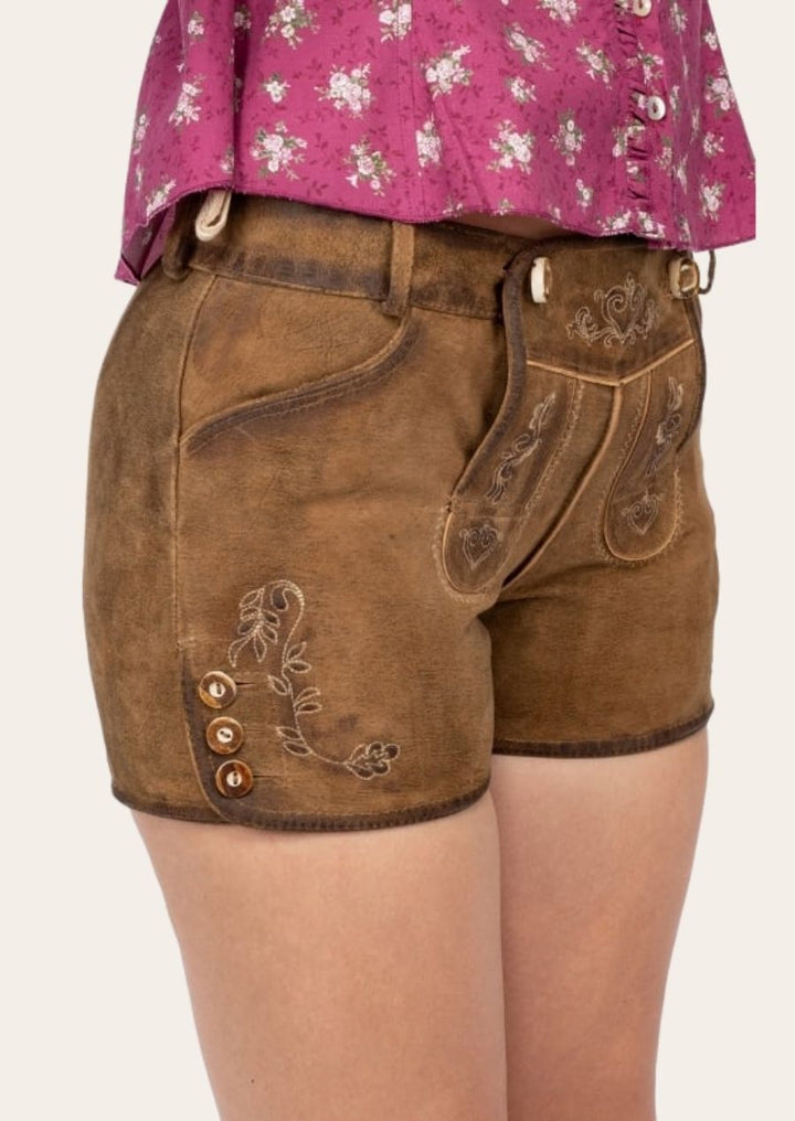 Handcrafted Lederhosen for women, blending rustic charm with feminine Bavarian elegance.