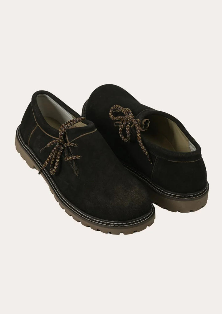 Rustic Bavarian leather boots for men, crafted for durability and festival-ready style.