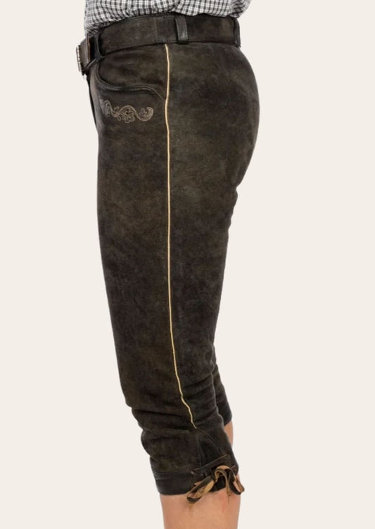 Traditional Alpine Women’s Bundhosen crafted from high-quality leather, designed for festive gatherings.