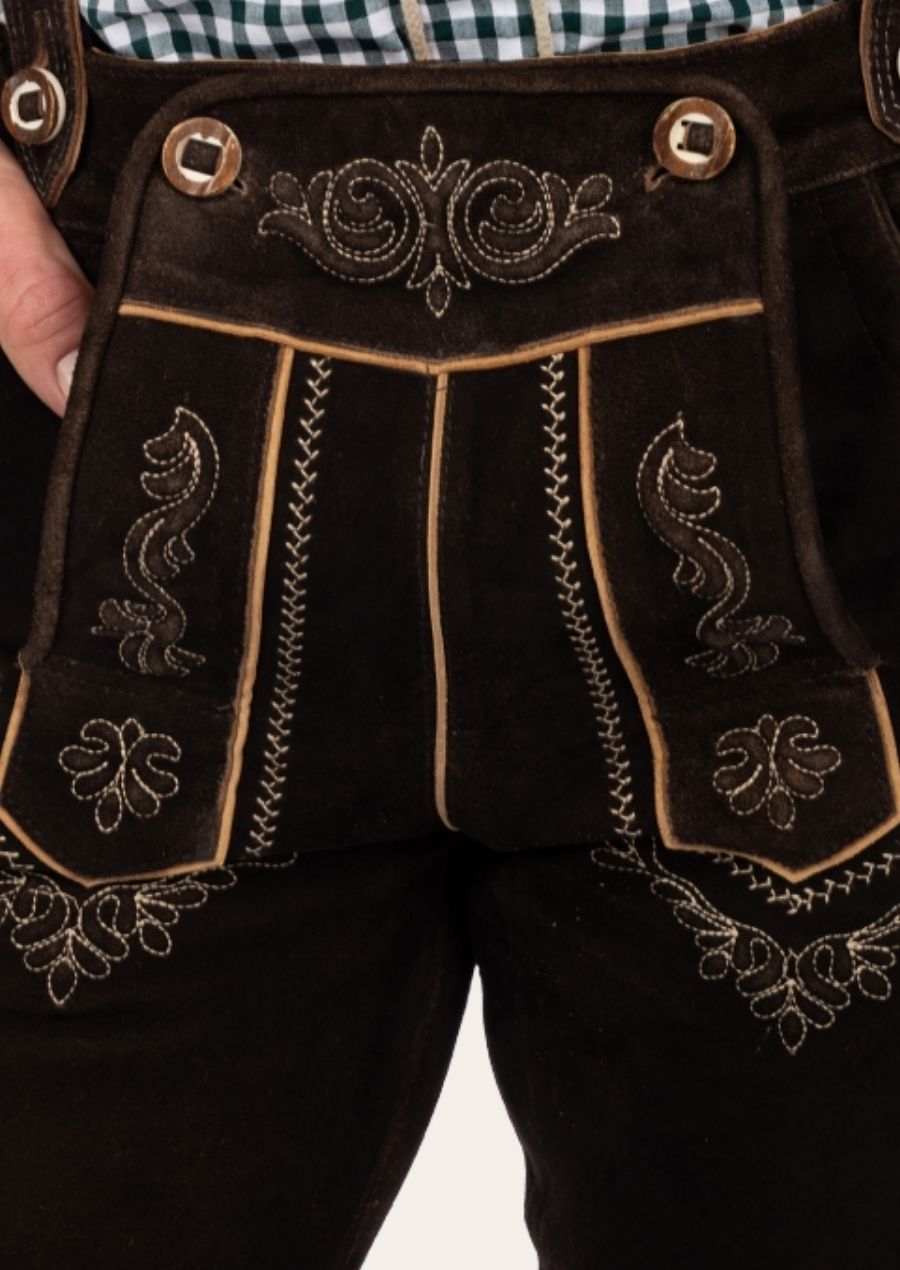 Men’s traditional brown leather Bundhosen with suspenders, offering a timeless Bavarian look.